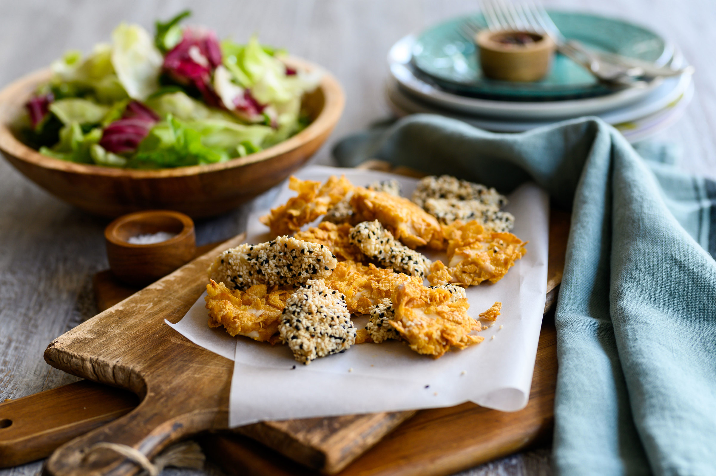 Homemade chicken nuggets breaded with sesame, Lurpak® butter and corn flakes Arla